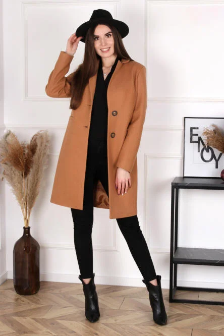 Model in a camel coat